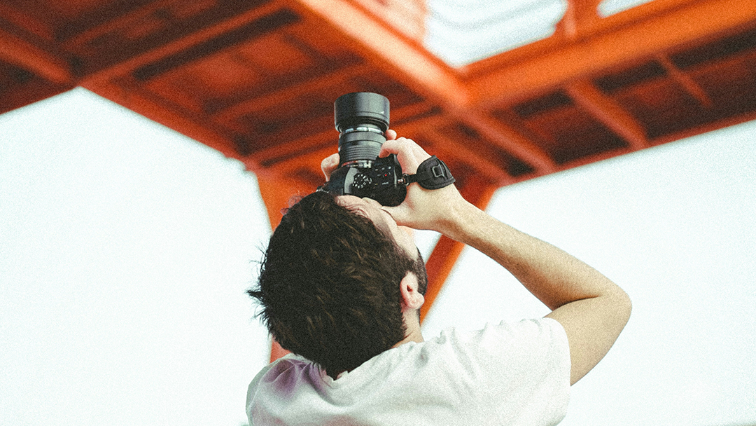 Photographer capturing a construction site